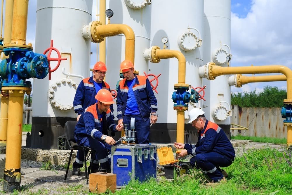 Inspecting a gas pipeline for maintenance - Specialist ensuring pipeline safety.